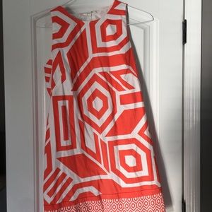 Orange and white pattern knee length dress